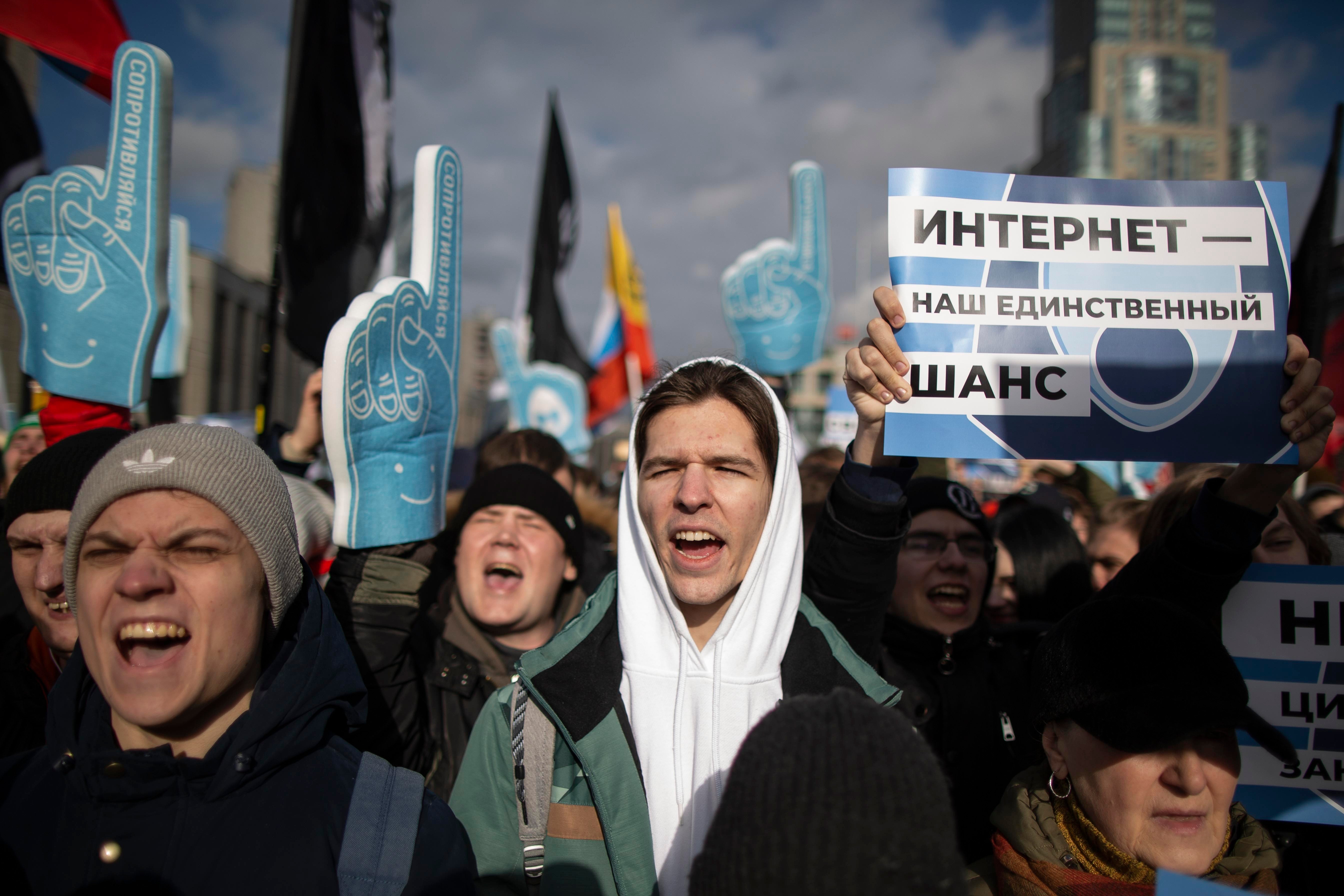 Demonstrators, with a poster on the right reading "internet is our only chance," attend the Free Internet rally in response to a bill making its way through parliament calling for all internet traffic to be routed through servers in Russia— making VPNs (virtual private networks) ineffective, in Moscow, Russia, Sunday, March 10, 2019.