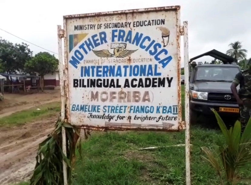 screenshot of school sign. image is outdoors. mother francisca massacre