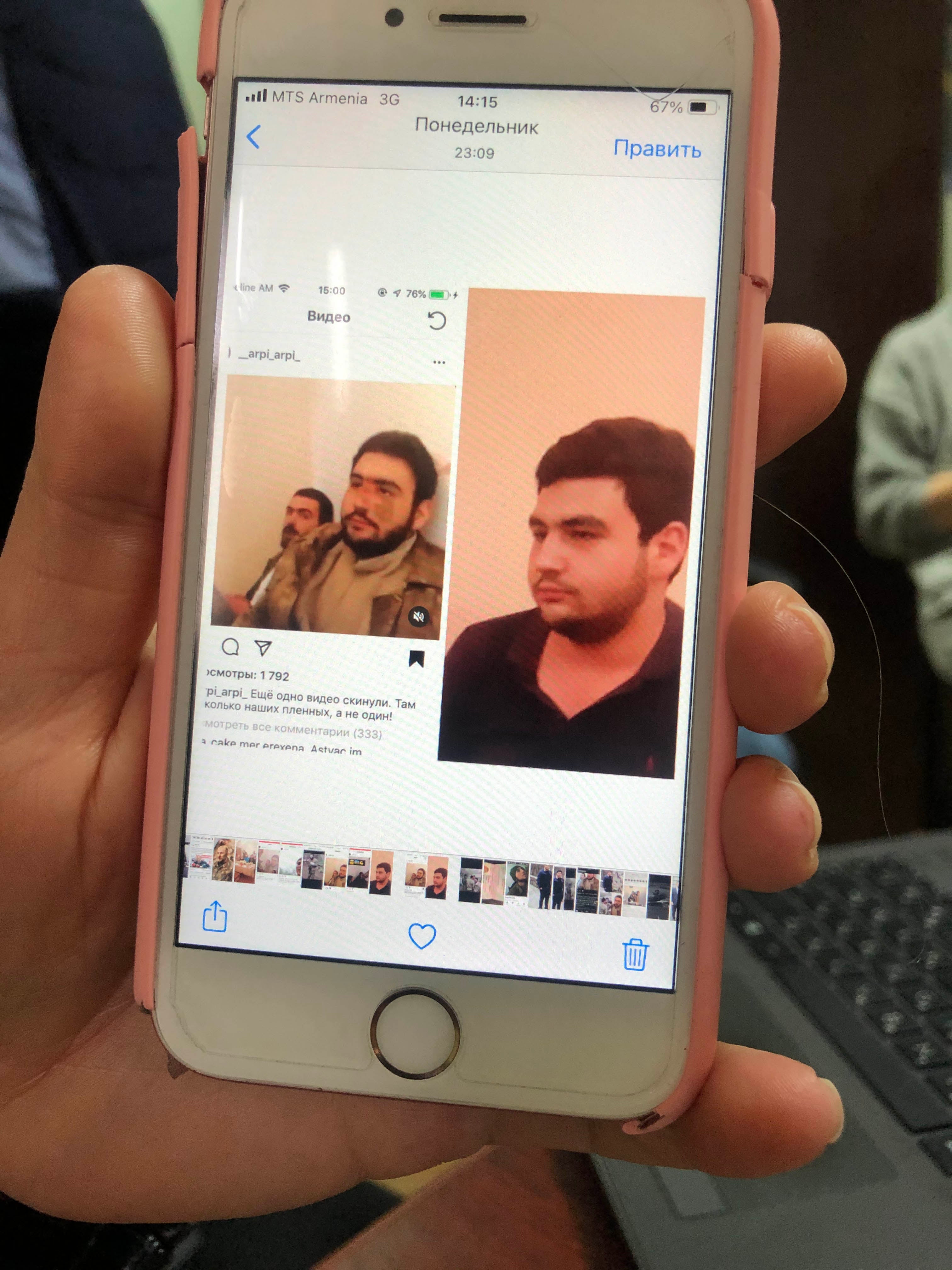 Varduhi Parunakyan, mother of Robert Vardanian shows his photographs to Human Rights Watch. Yerevan, November 2020.