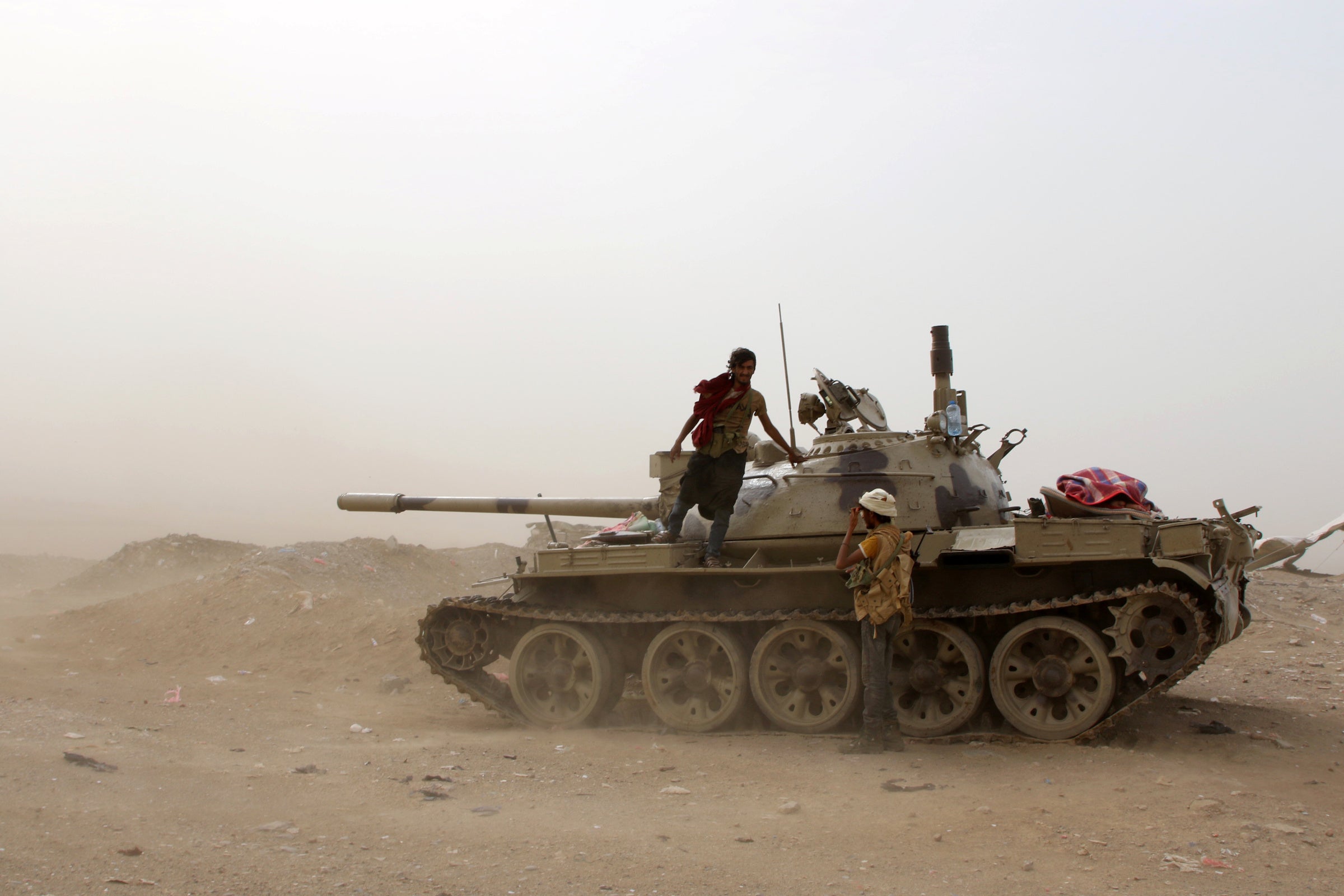 Members of UAE-backed southern Yemeni separatist forces stand by a tank during clashes with government forces in Aden, Yemen August 10, 2019.