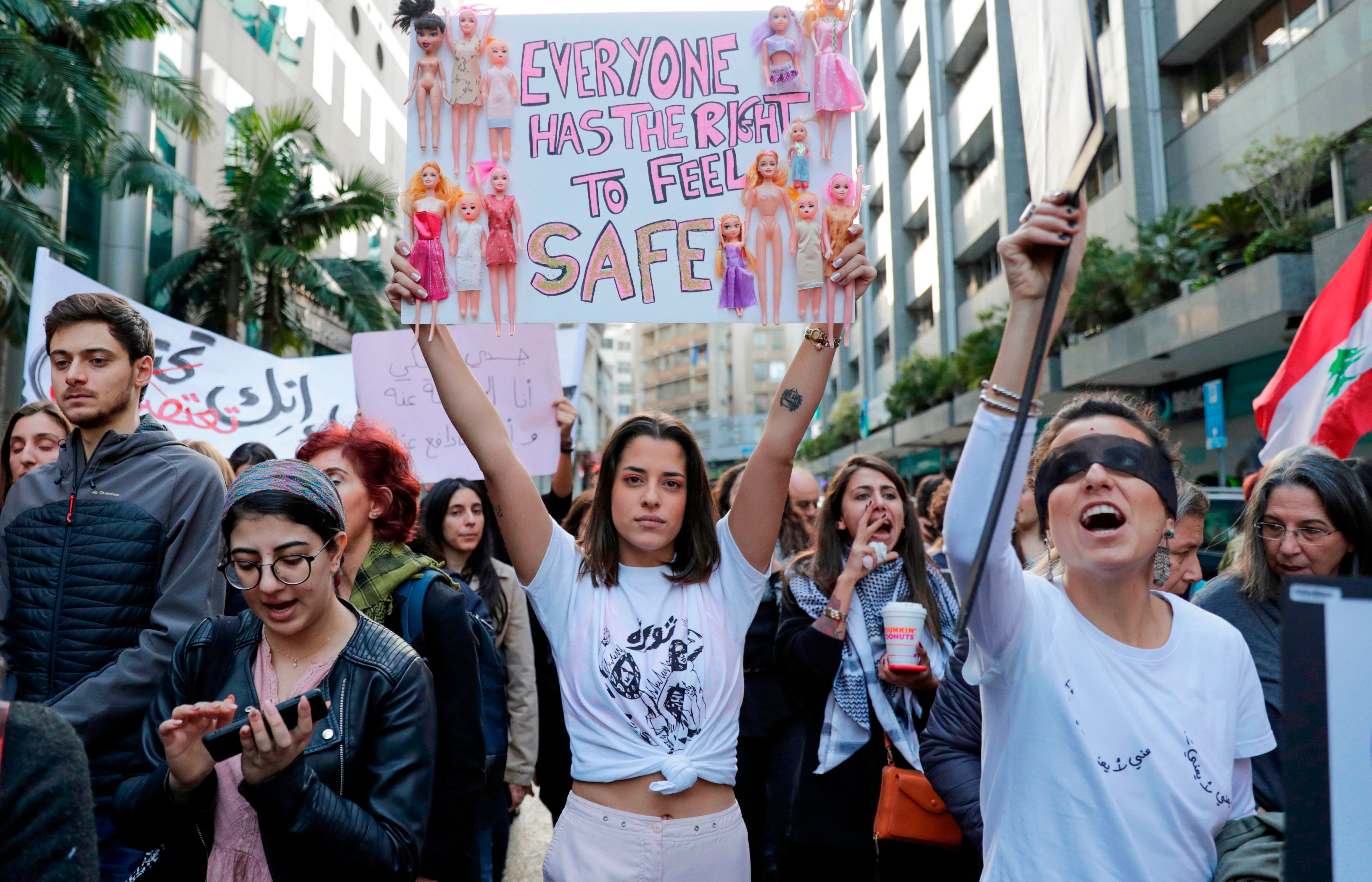 Activists take part in a demonstration against sexual harassment, rape, and domestic violence in the Lebanese capital Beirut on December 7, 2019.