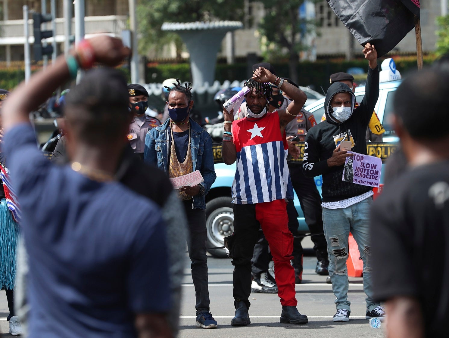 Supporters of West Papua shout slogans during a rally in Jakarta, Indonesia on December 1, 2020. 
