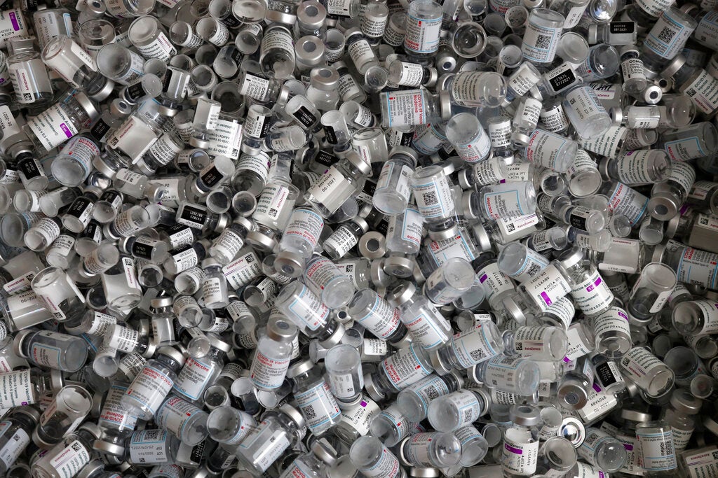 Empty vials of the Pfizer-BioNTech, Moderna and AstraZeneca COVID-19 vaccine lie in a box during a vaccine campaign at the Vaccine Village in Ebersberg, Germany on May 15, 2021.