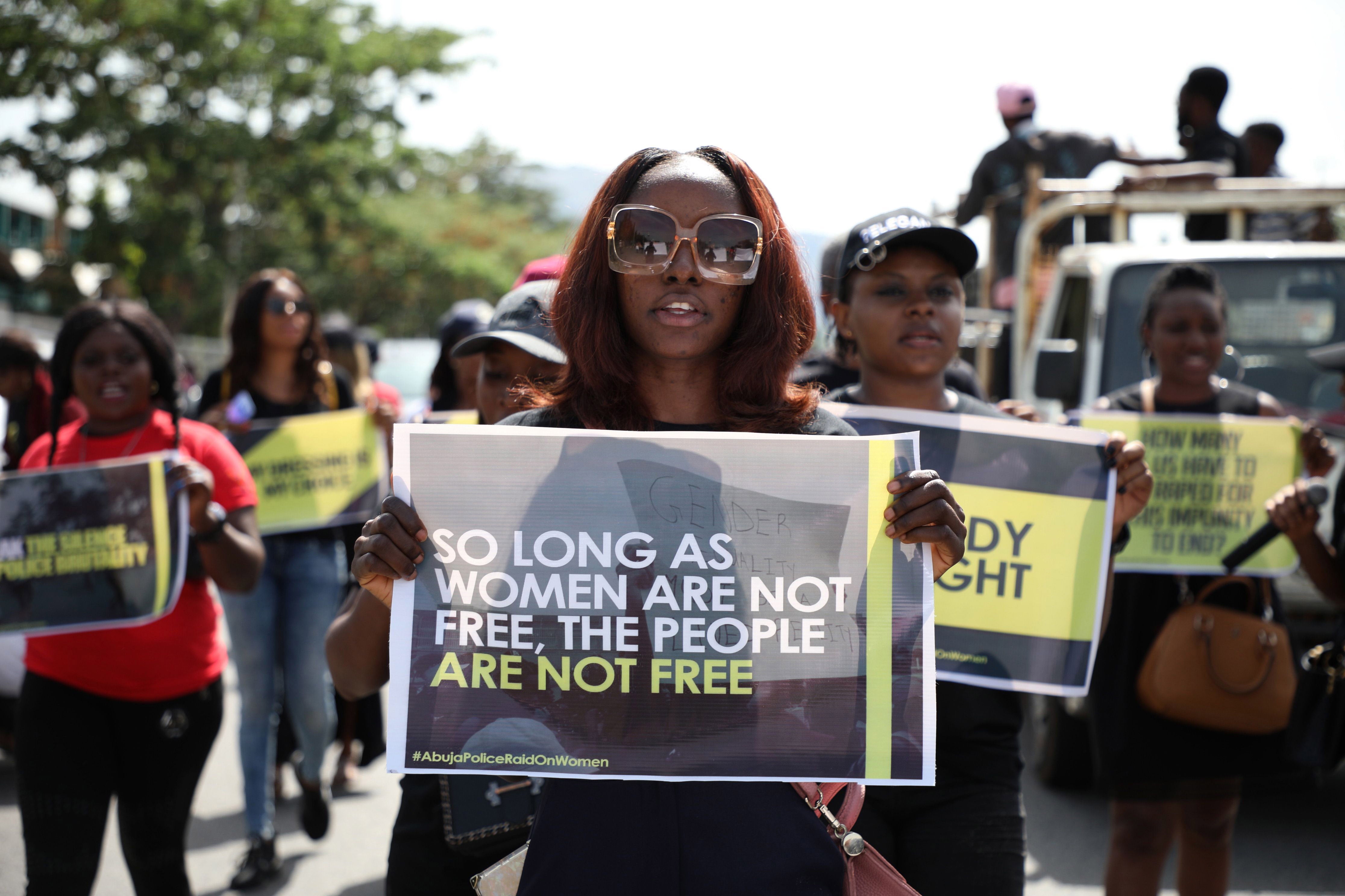 Women march during a protest to challenge impunity and gender-based discrimination raids on women in Abuja, Nigeria, May 10, 2019.