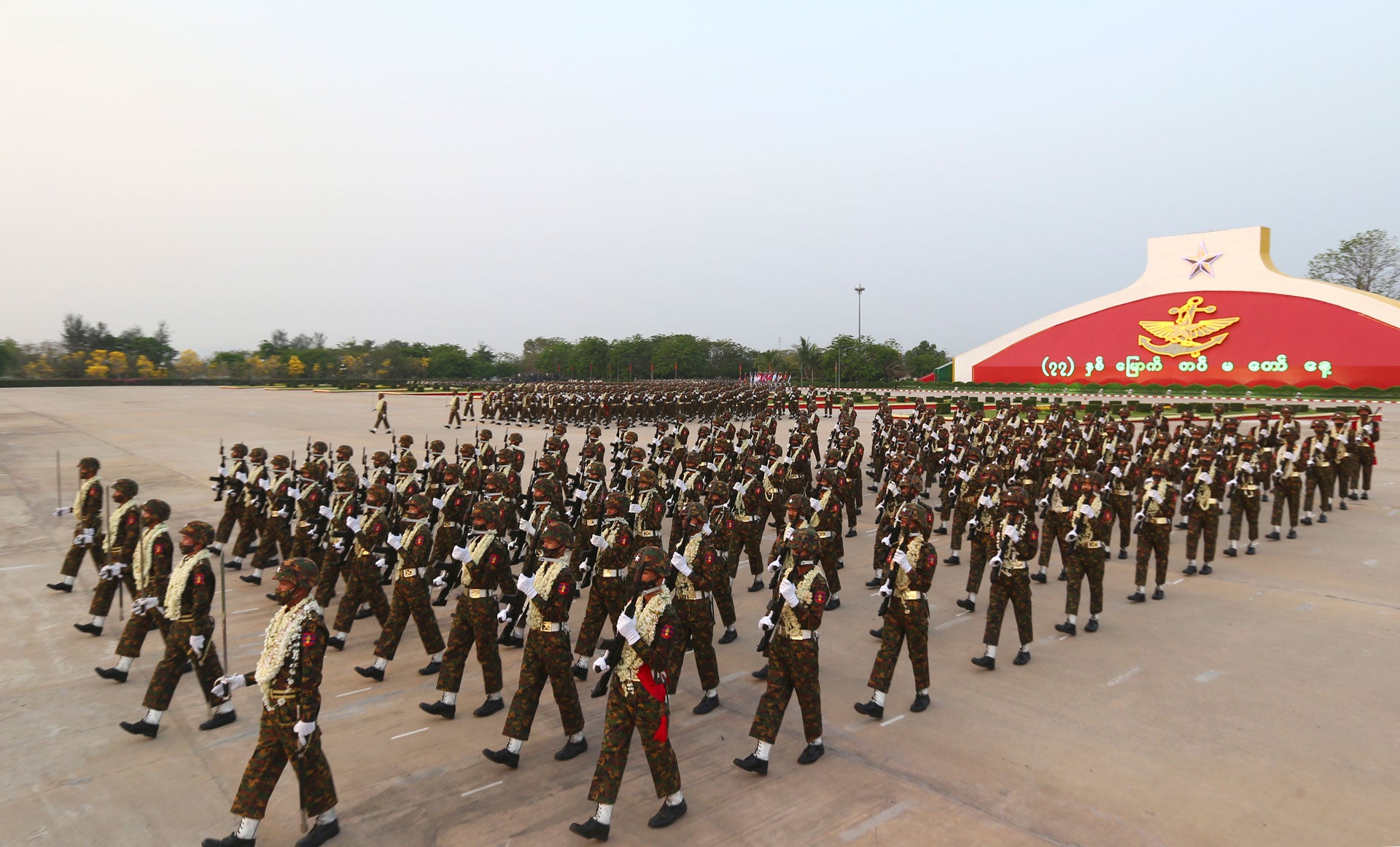 Myanmar military officers march during a parade