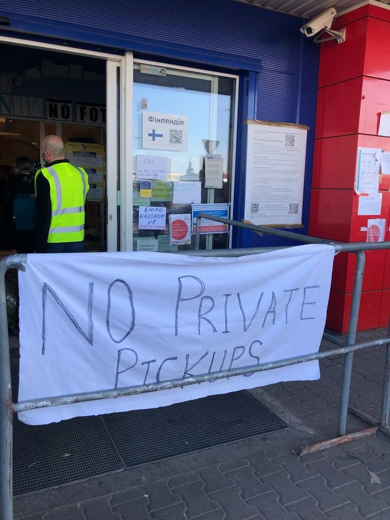 A sign outside the Tesco refugee reception center in Przemyśl, Poland, where the coordinator said they had prohibited offers of private transport for refugees two days prior, March 23, 2022.