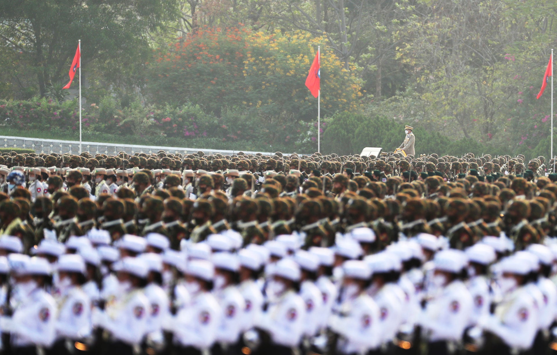 Officers march during a parade