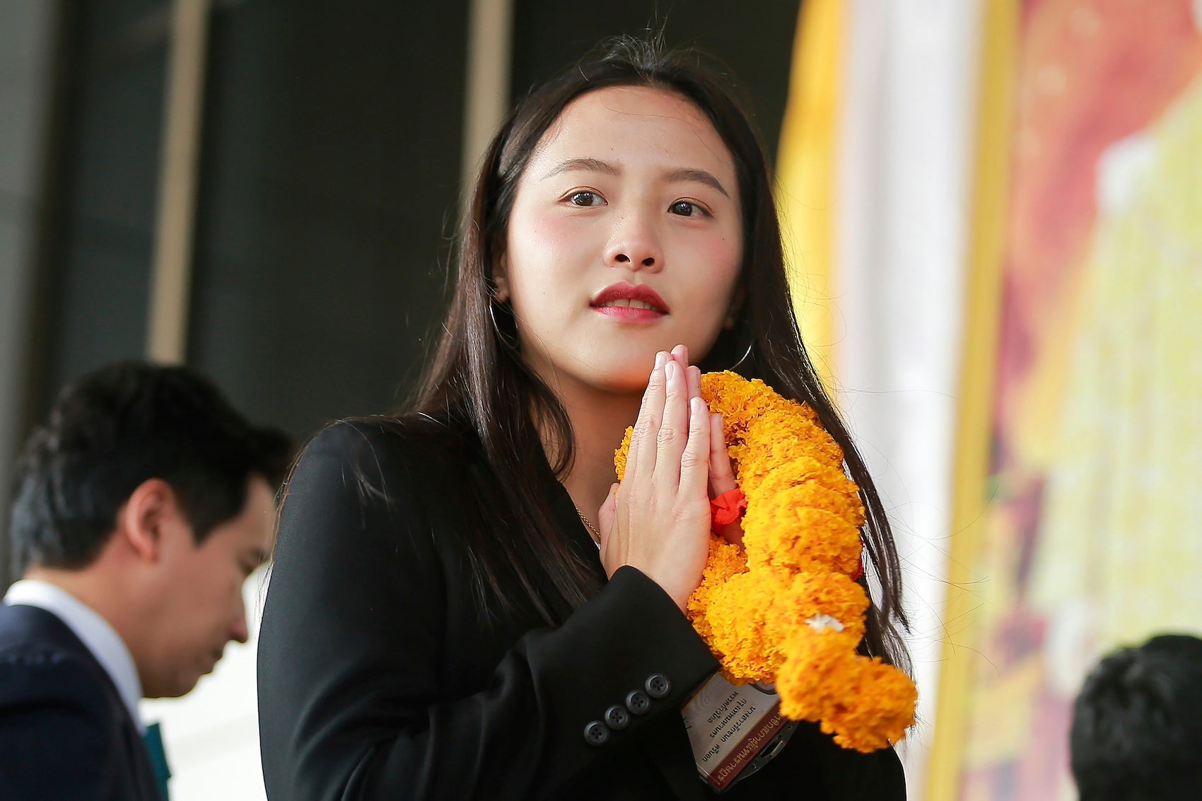 Parliament member Rukchanok Srinork of Thailand's opposition Move Forward party arrives at criminal court for the verdict for allegedly violating the lese majeste law in Bangkok, Thailand, December 13, 2023.