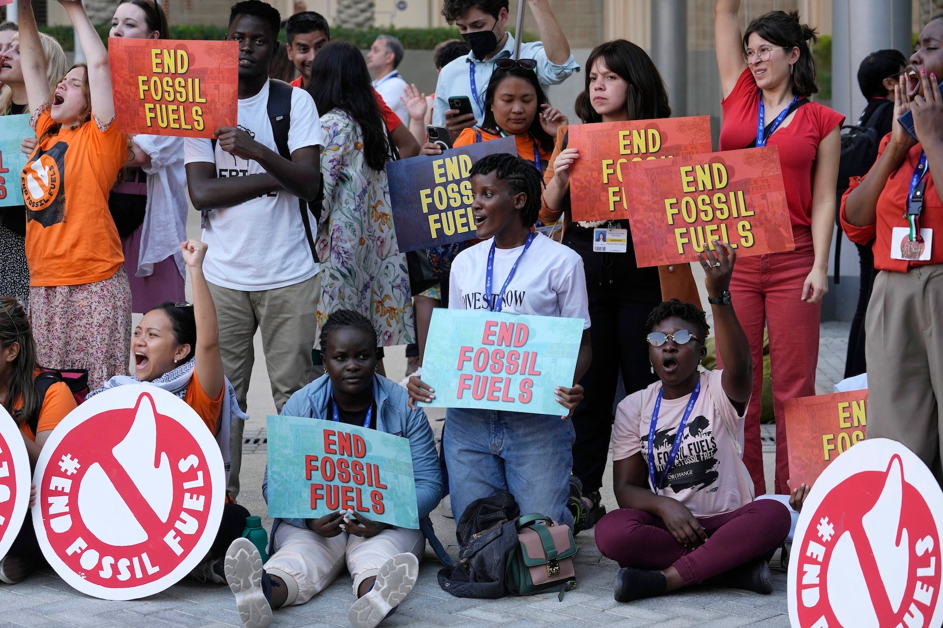 Vanessa Nakate, of Uganda, center, takes part in a protest against fossil fuels at the COP28 U.N. Climate Summit in Dubai, United Arab Emirates, December 5, 2023. 