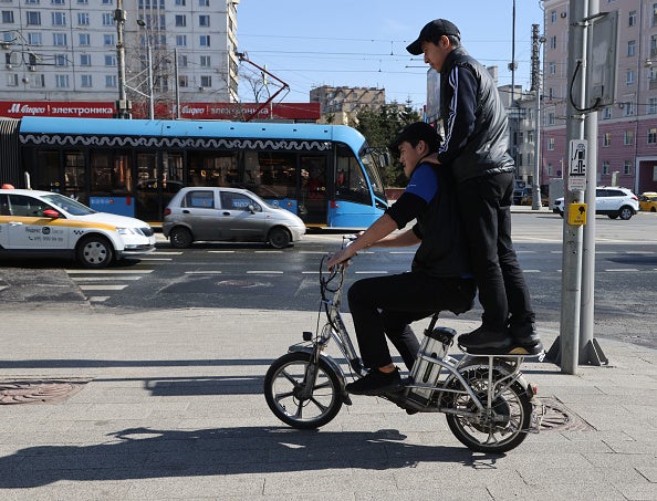 Two work migrants from Central Asia in Moscow, Russia, April 14, 2023.