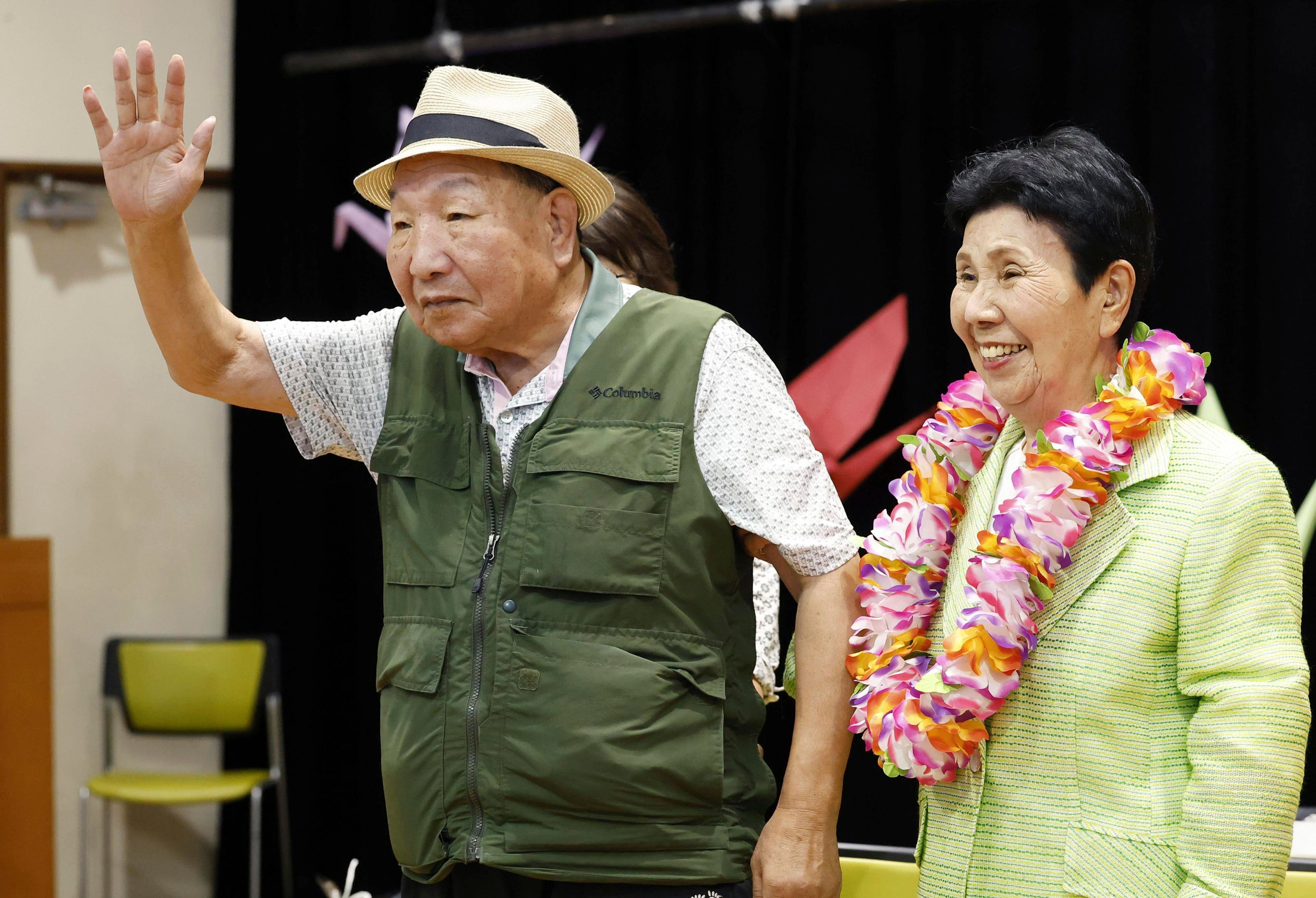 Iwao Hakamata waves to supporters while meeting with his sister Hideko, several weeks after his acquittal on retrial for the 1966 murder of a family of four, in Shizuoka, Japan, October 14, 2024.