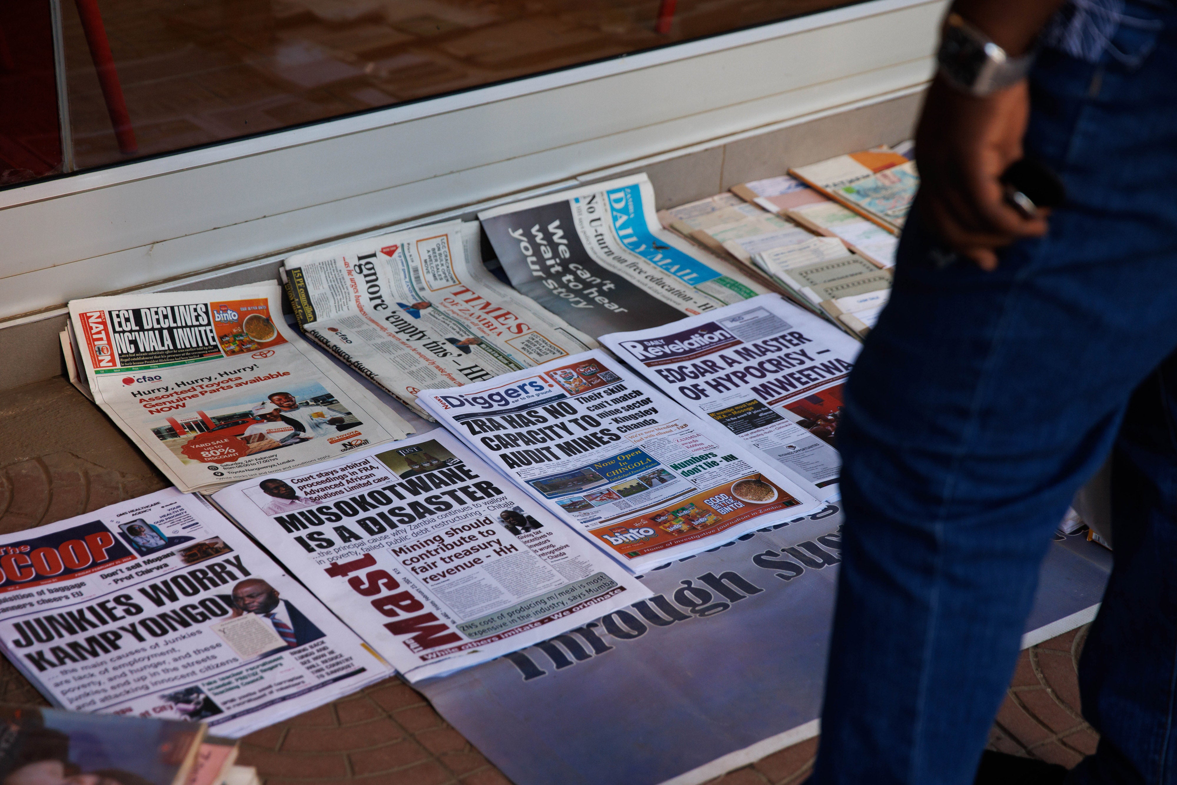 Newspapers for sale outside a store in Lusaka, Zambia, on February 23, 2024.