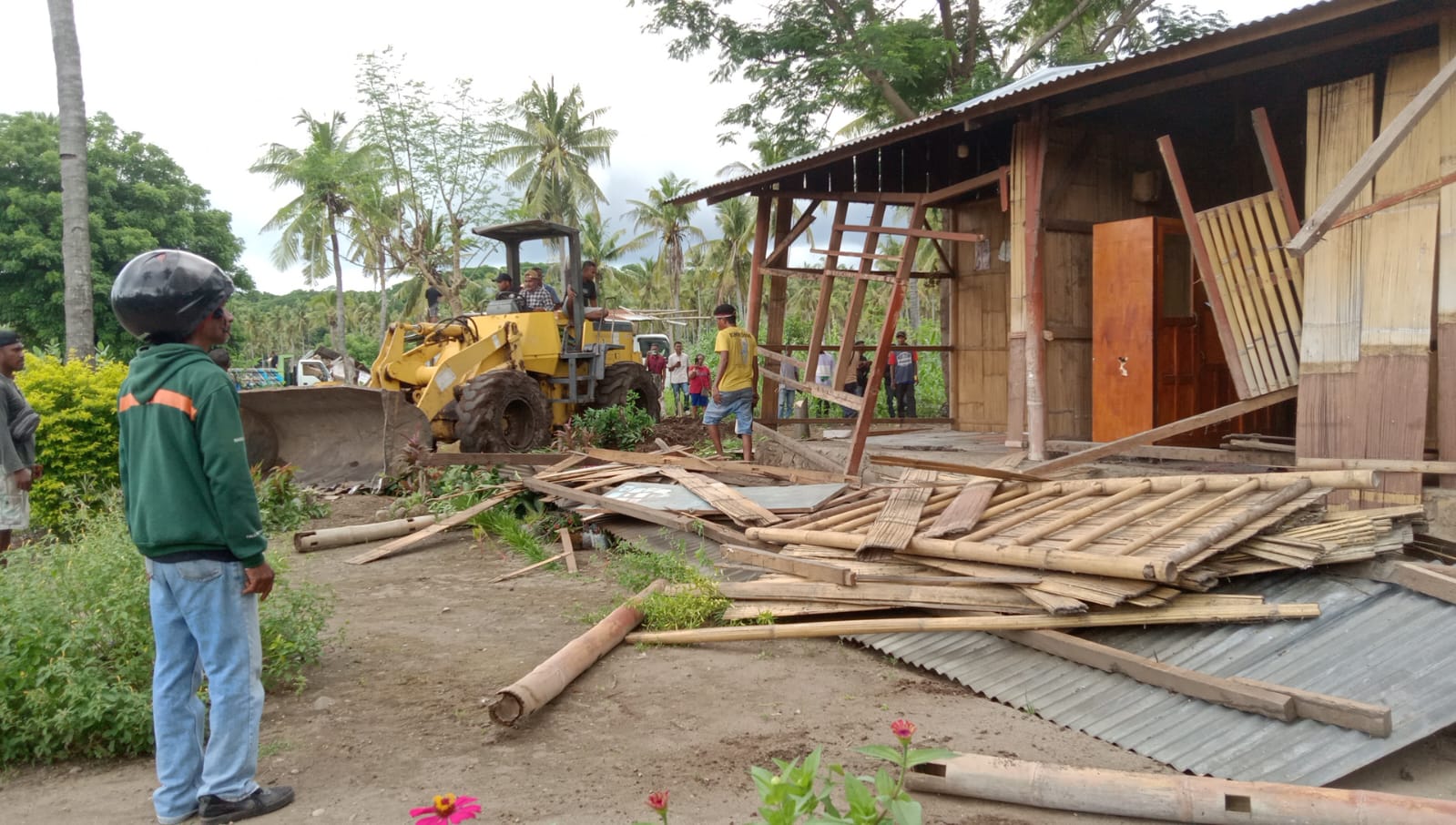 PT Kristus Raja Maumere, a company owned by the Roman Catholic Diocese of Maumere, using excavators to demolish buildings and evict residents on Flores island, Indonesia, January 22, 2025.