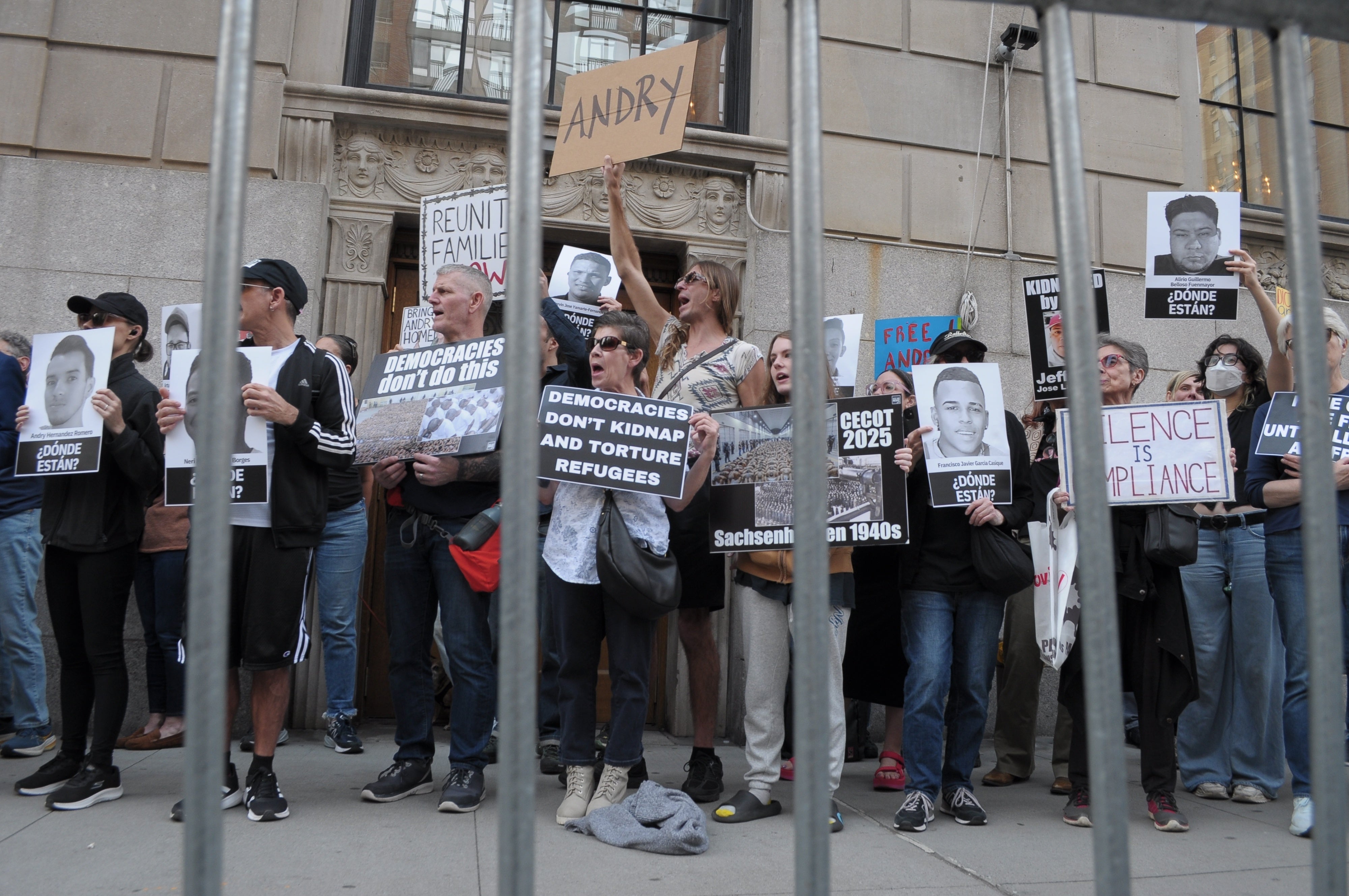 Demonstrators holding up placards