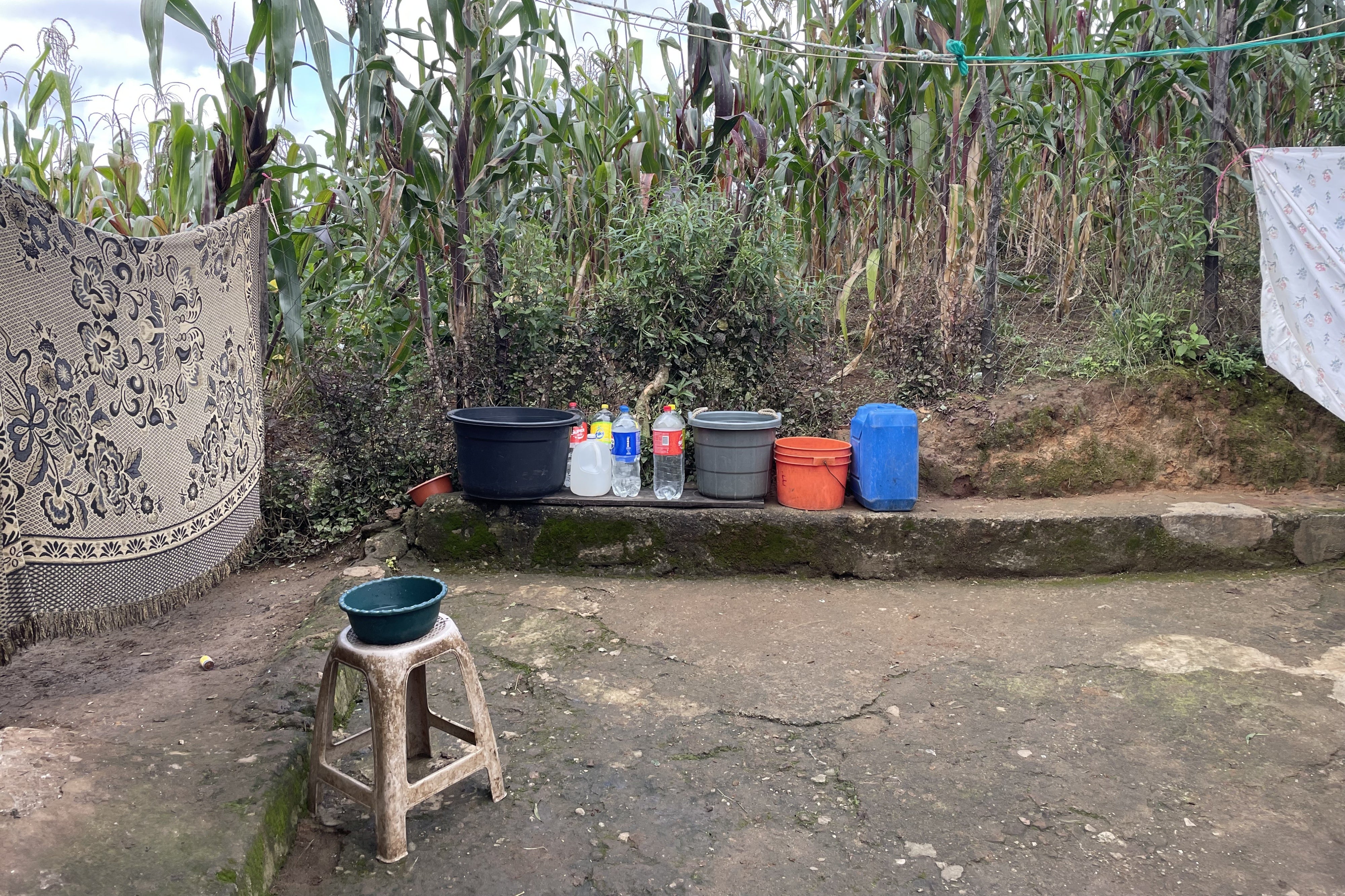 Containers used to collect and store water, including rainwater, at a home in Aldea Xecachelaj,  Santa María Chiquimula, Totonicapán department. 