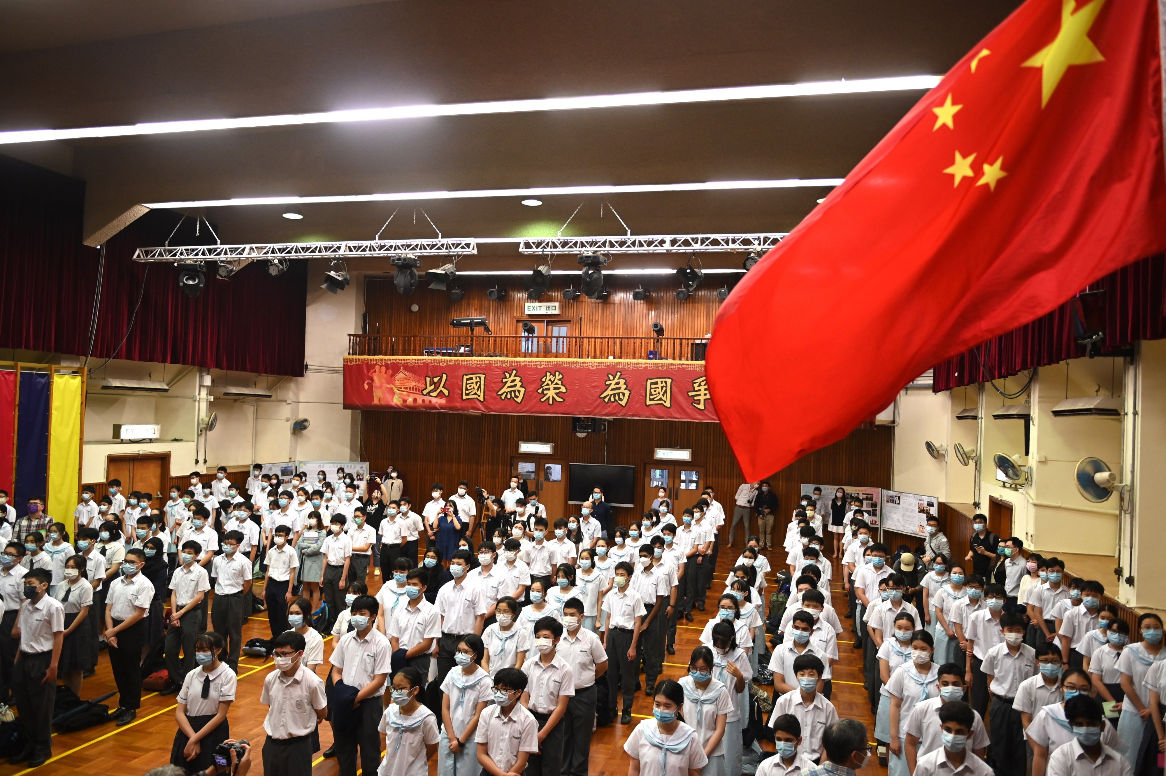 A flag raising ceremony on National Security Education Day at a secondary school in Hong Kong, China, April 15, 2021.