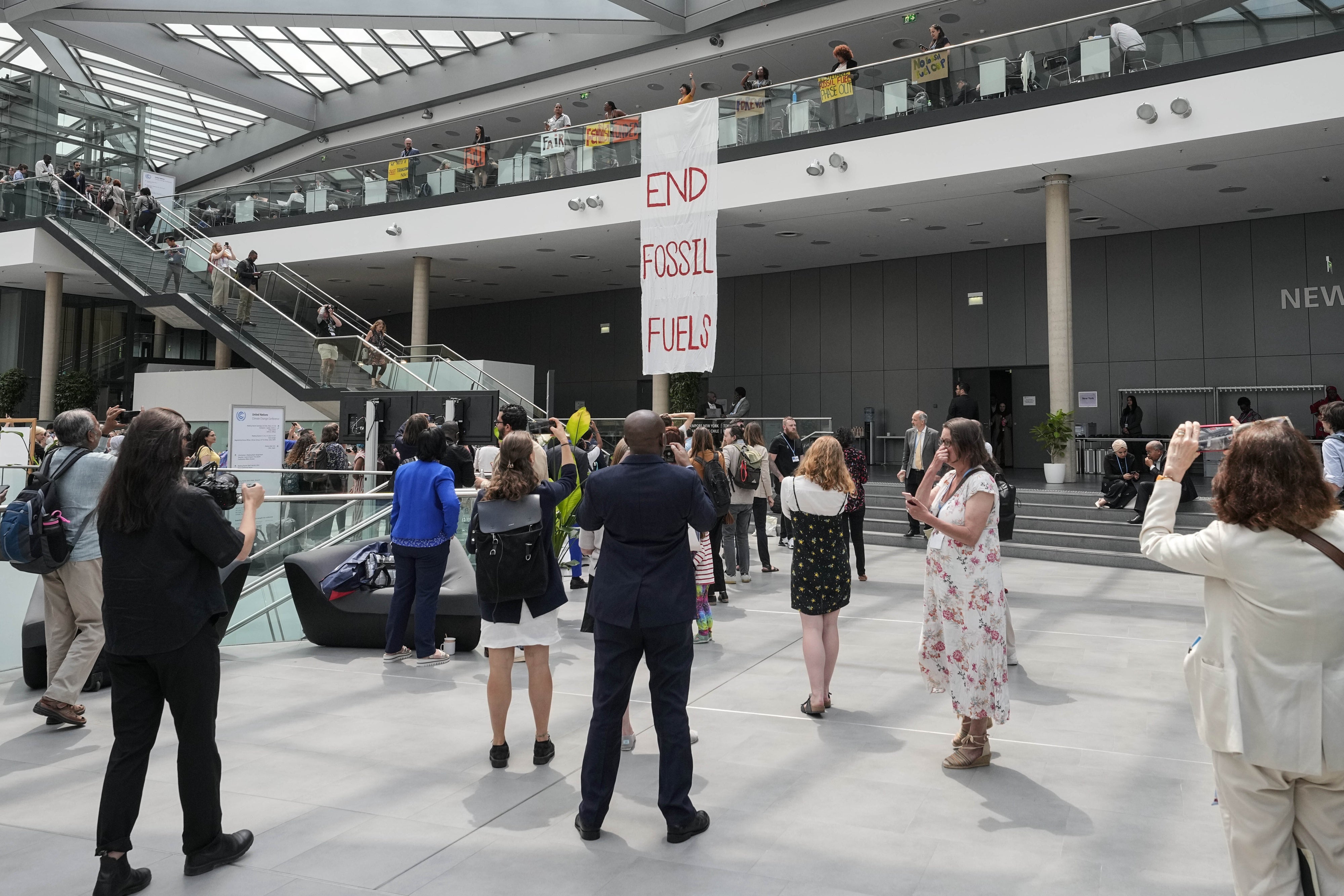 Climate activists protest to end use of fossil fuels at the UN Climate Change Conference in Bonn, Germany, June 8, 2023.