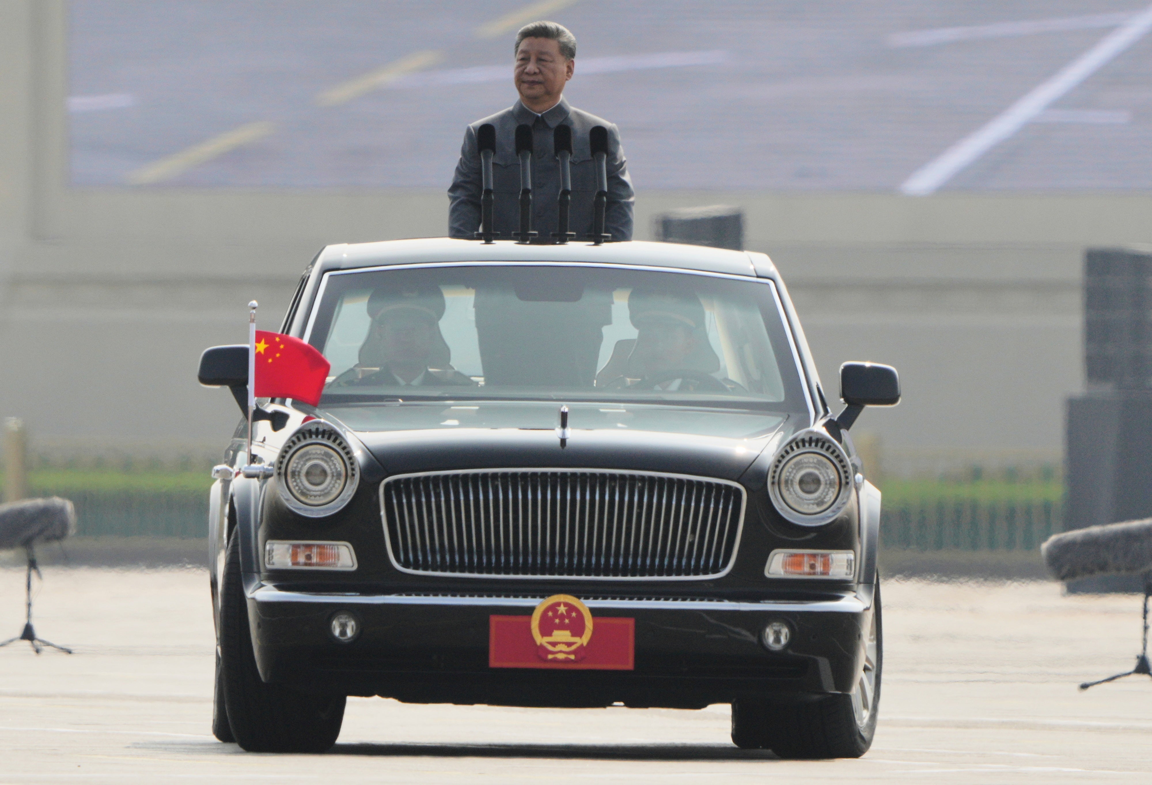 Chinese president Xi Jinping rides in a motorcade