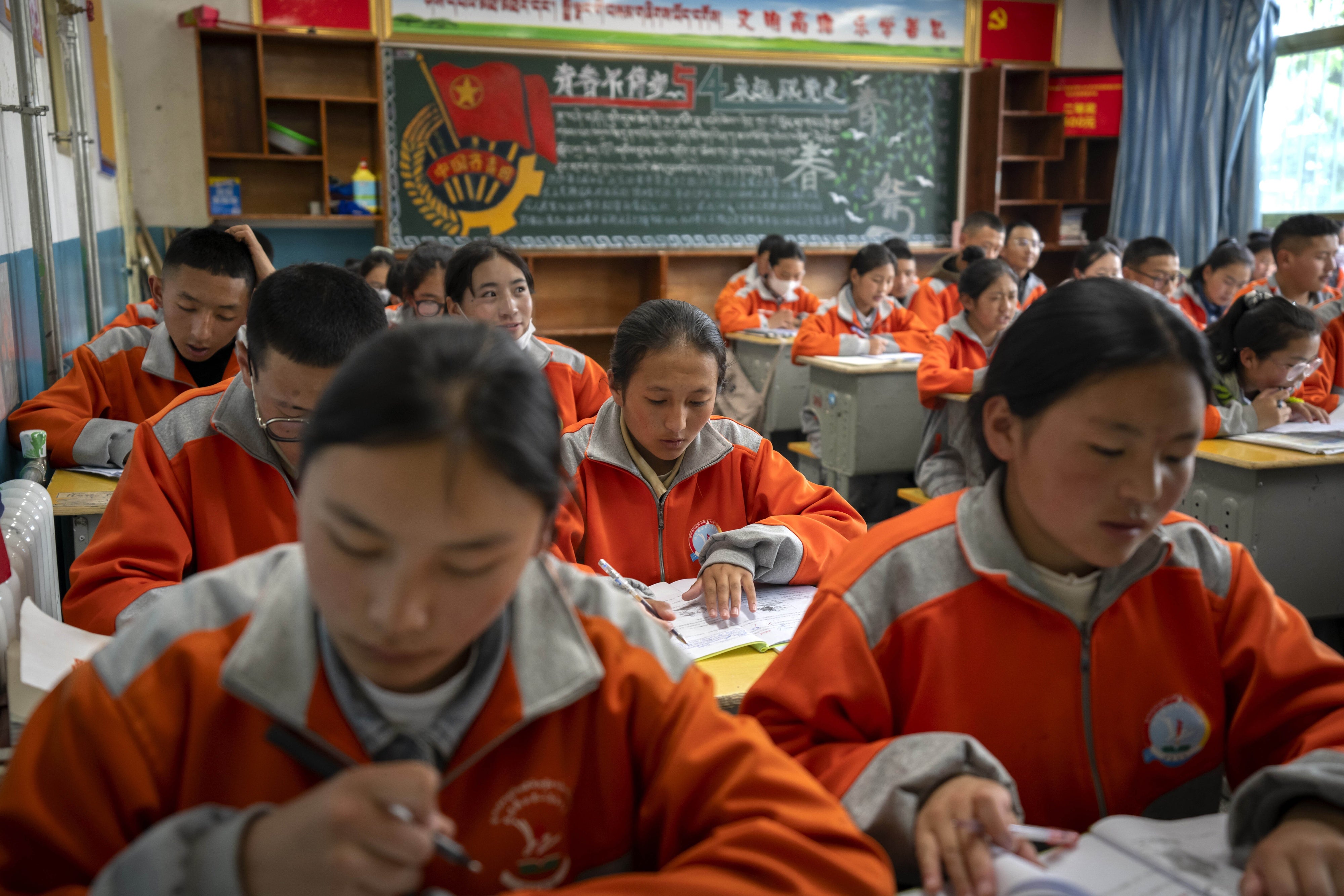 High school students attend a Chinese language class at a public boarding school for students from northern Tibet, in Lhasa in China's Tibet Autonomous Region, June 1, 2021.