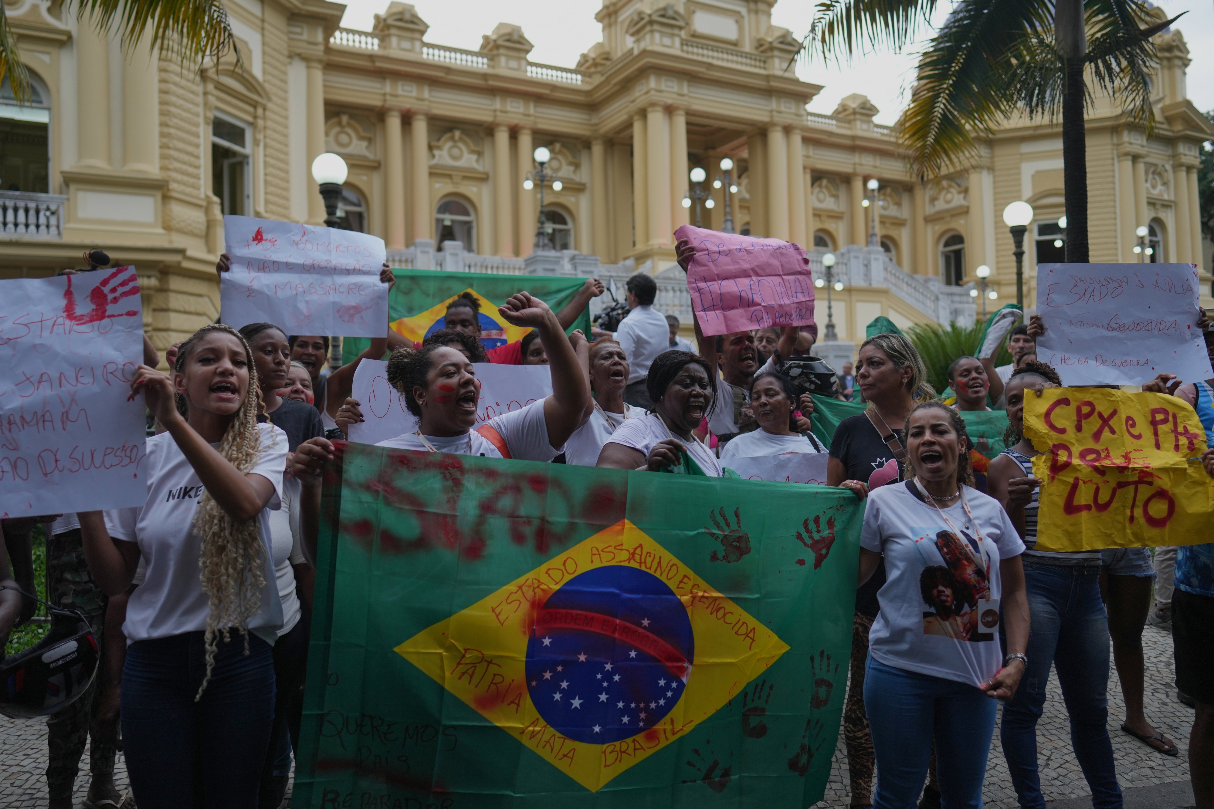 Penha favela residents protest in front of the Guanabara Palace against a deadly police operation on alleged drug traffickers of the Comando Vermelho gang, in Rio de Janeiro, October 29, 2025. 