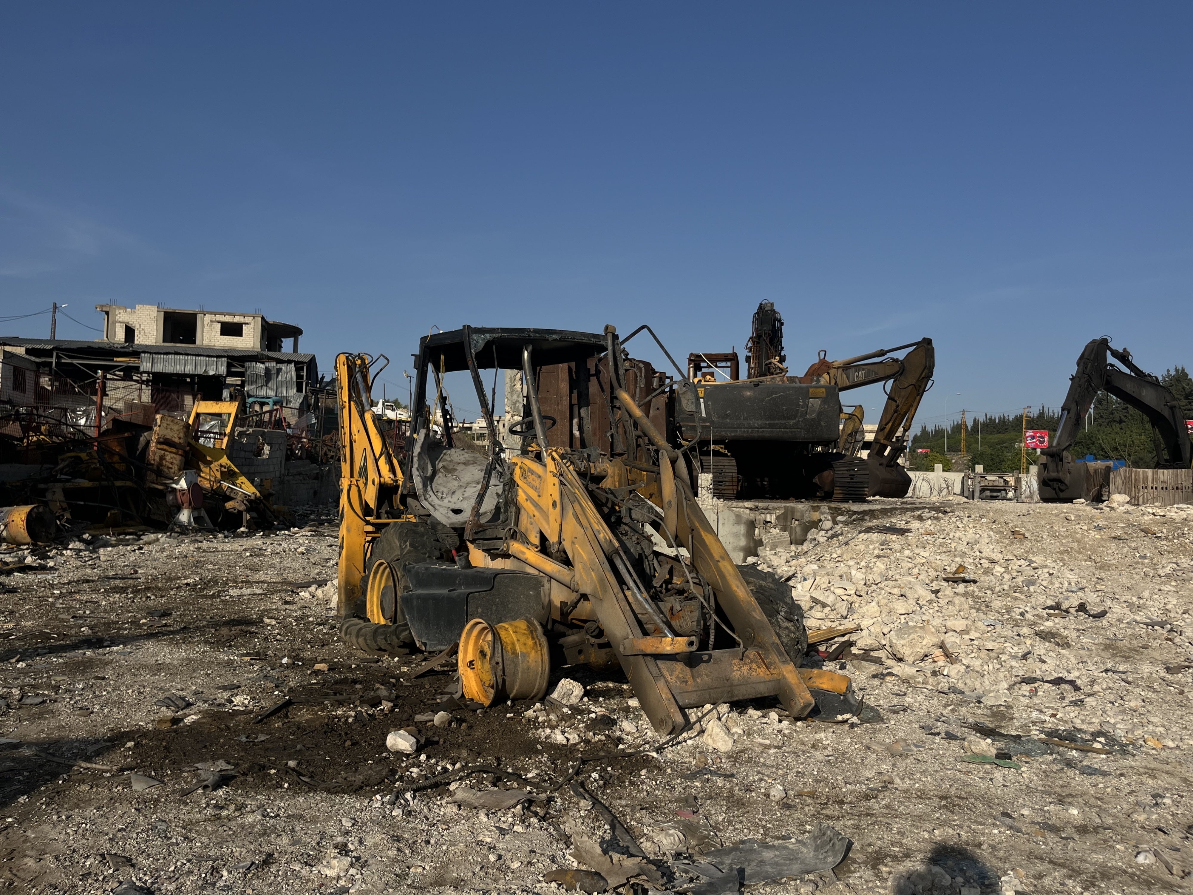 A destroyed bulldozer and other damaged heavy machinery from an Israeli airstrike on September 3, 2025 on Ansariyeh, southern Lebanon.