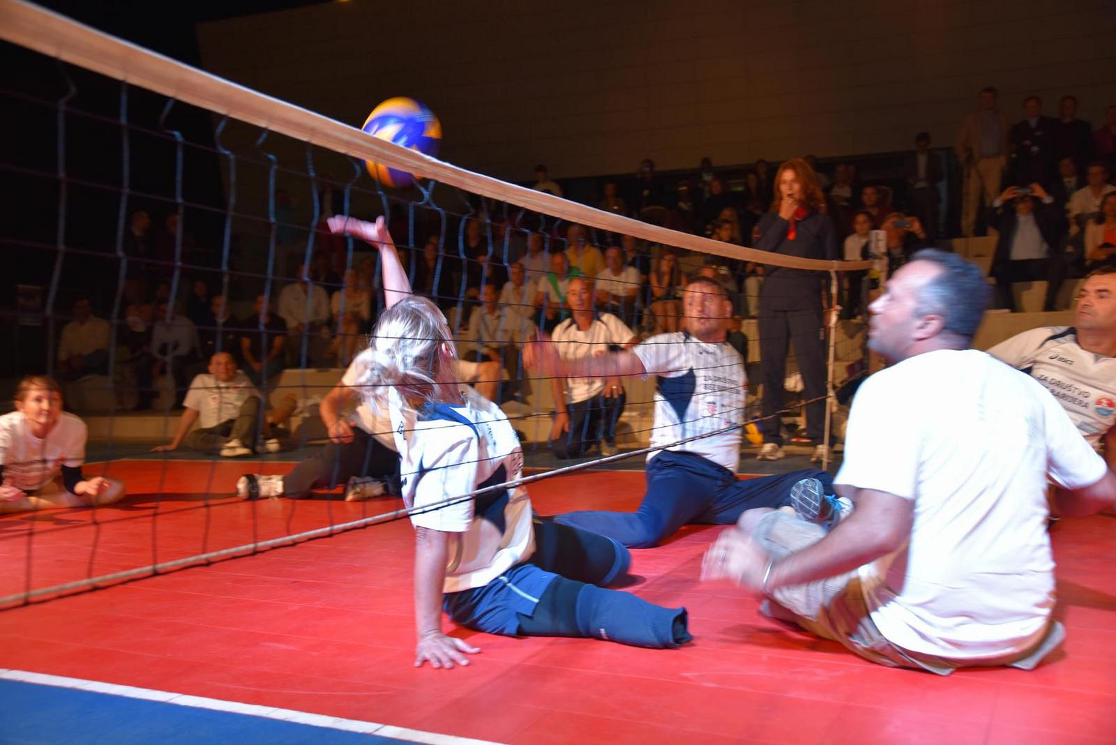 Cluster munition survivors who lost their legs play sitting volleyball one evening with participants of the First Review Conference of the Convention on Cluster Munitions in Dubrovnik, Croatia © 2015 Mark Hiznay/Human Rights Watch