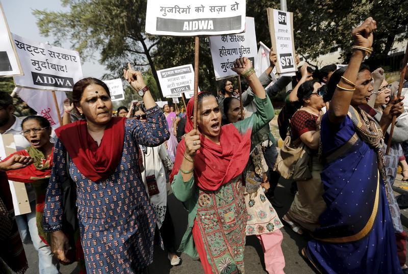 Activists from All India Democratic Women's Association (AIDWA) shout slogans as they carry placards outside the Haryana Bhawan during a protest in New Delhi, India, February 29, 2016 demanding a probe into what they said were rapes and sexual assaults in