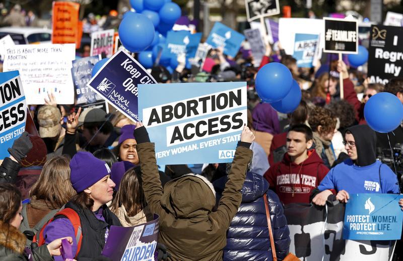 Protesters demonstrate in front of the U.S. Supreme Court in Washington, March 2, 2016.