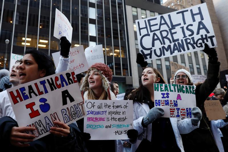 Demonstrators that include mostly medical students protest a proposed repeal of the Affordable Care Act in New York, U.S., January 30, 2017. 