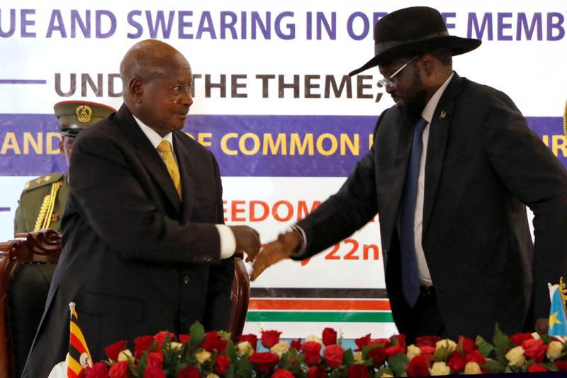 South Sudan's President Salva Kiir (R) and Ugandan President Yoweri Kaguta Museveni attend the opening of the National Dialogue committee in Juba, South Sudan May 22, 2017.