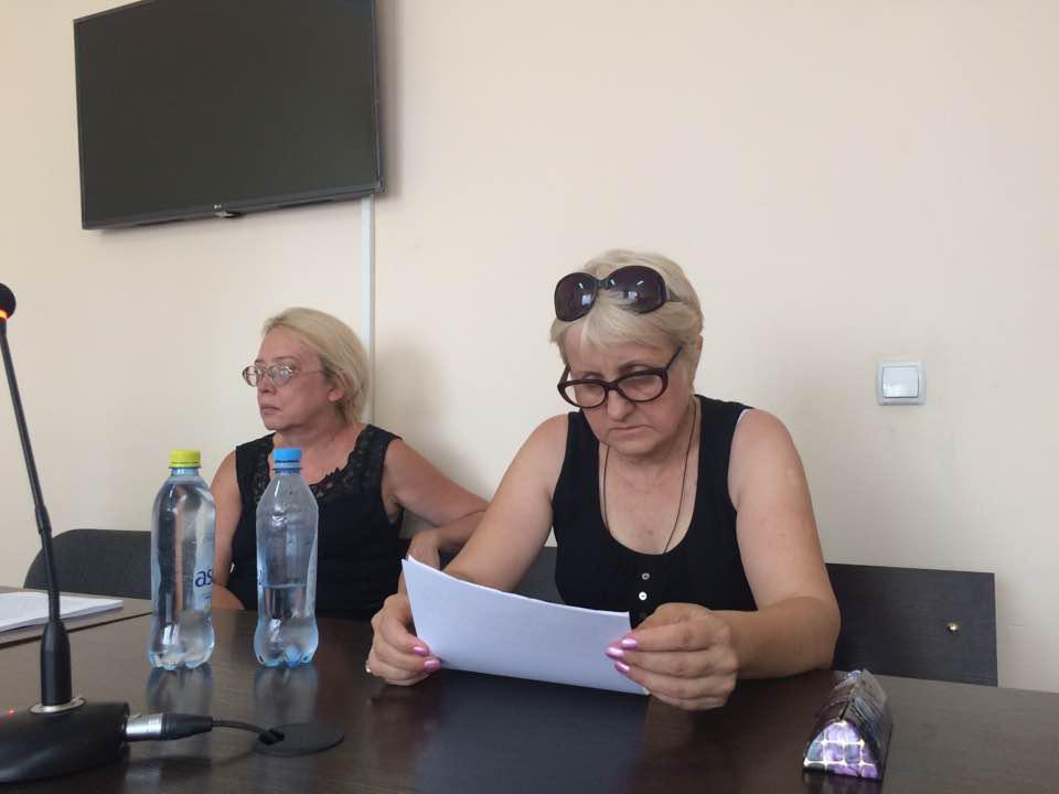 Larisa Kharkova, President of the Confederation of Independent Trade Unions of Kazakhstan (right), and her lawyer, Dina Volkova (left), seated before Khakova gives her closing statement in court on July 24, 2017. © Galym Ageleuov