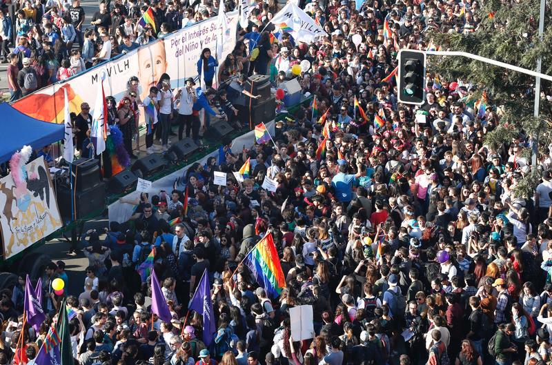 People attend a gay pride parade to demand for a new law for gender equality after Chilean President Michelle Bachelet sets marriage equality as the government's priority in Santiago, Chile July 1, 2017.