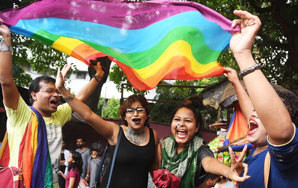 Indian members and supporters of the lesbian, gay, bisexual, transgender (LGBT) community celebrate the Supreme Court decision to strike down a colonial-era ban on gay sex, in Kolkata on September 6, 2018.
