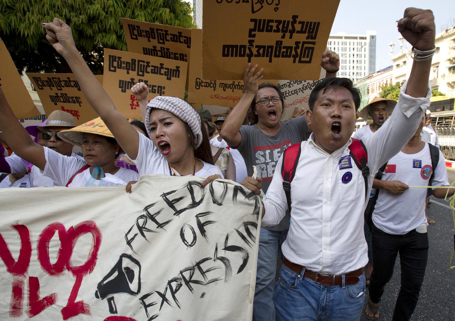 Demonstrators shout slogans at a protest against an amendment to Myanmar’s public assembly law in Yangon, March 5, 2018. 