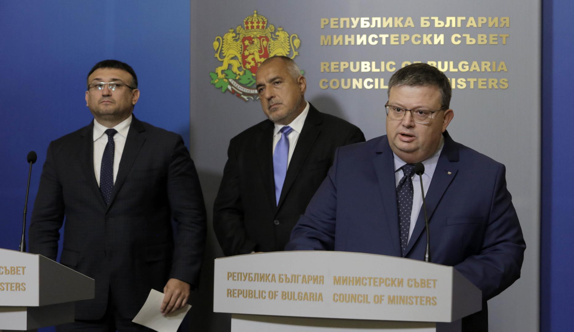 Bulgaria's prosecutor general Sotir Tsatsarov, right, speaks during a press conference in Sofia, on Wednesday, Oct. 10, 2018.
