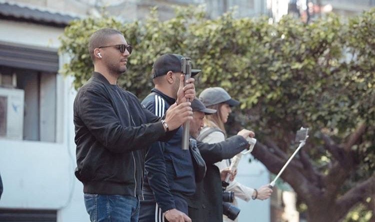 Journalist Khaled Drareni filming street protests in Algiers, December 2019.