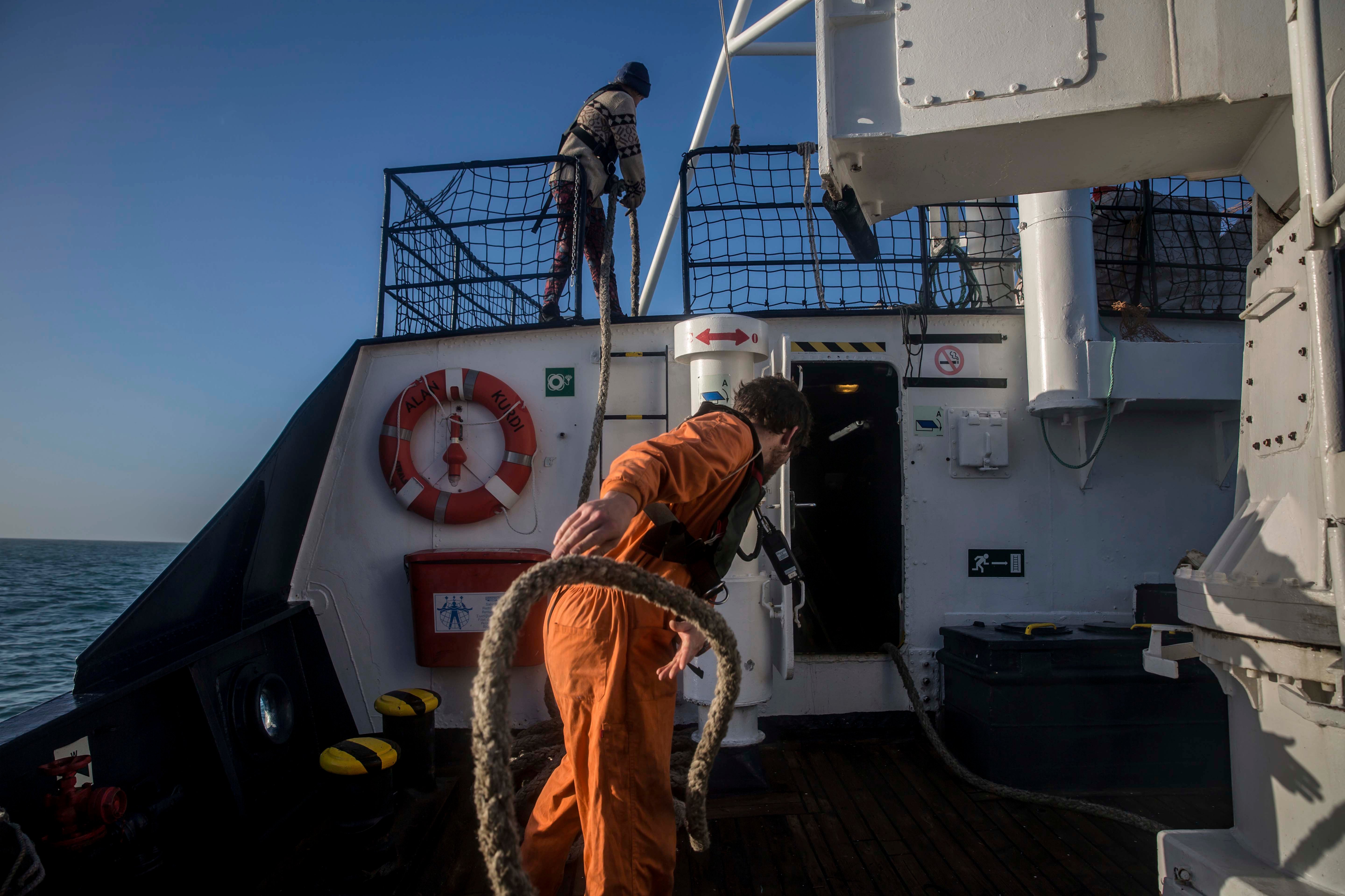 Crew work seen on the Alan Kurdi rescue ship, operated by German charity Sea Eye. 