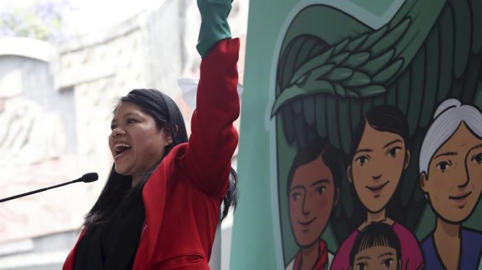 Marcelina Bautista, leader of Centro de Apoyo y Capacitación para Empleadas del Hogar, a domestic workers organization, celebrates the beginning of a pilot program extending access to social security and healthcare benefits for domestic workers, Mexico City, Mexico. 