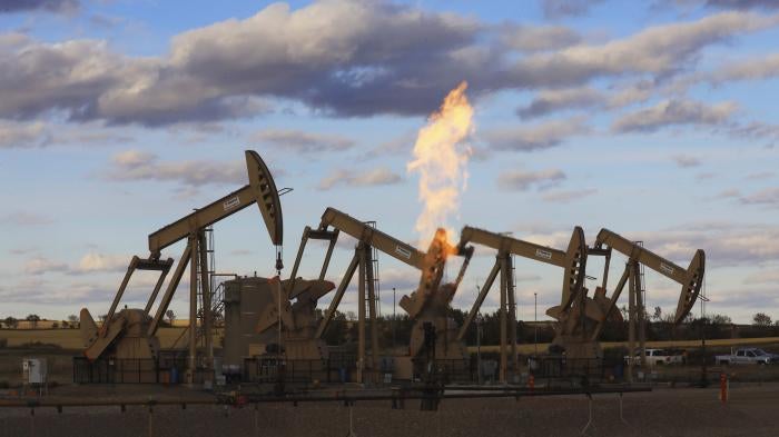 Pumpjacks at an oil well site near Epping, N.D., Oct. 1, 2018. © 2018 Jim Wilson/The New York Times/GDA via AP Images