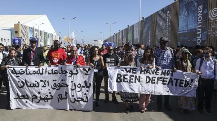 Sanaa Seif, sister of jailed Egyptian-British activist Alaa Abdel-Fattah, who went on a full hunger and water strike with the start of COP27 protesting his unjust imprisonment, takes part in the COP27 Coalition march during the 2022 United Nations Climate Change Conference COP27.
