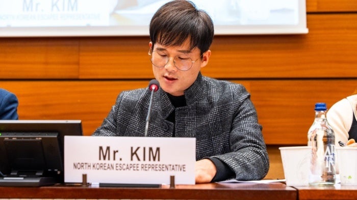 Kim Il Hyuk delivering a speech.