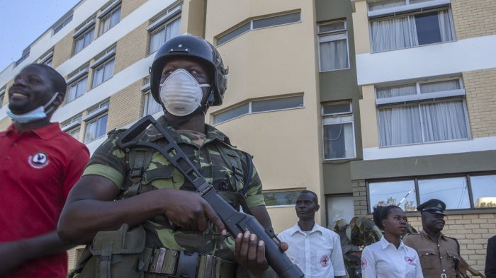 A policeman stands outside a hotel in Blantyre, Malawi, May 6, 2020.