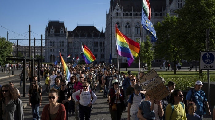 Hungarians march in downtown Budapest to protest against a new law banning LGBTQ+ Pride events and the populist government's restriction on assembly rights, May 1, 2025.