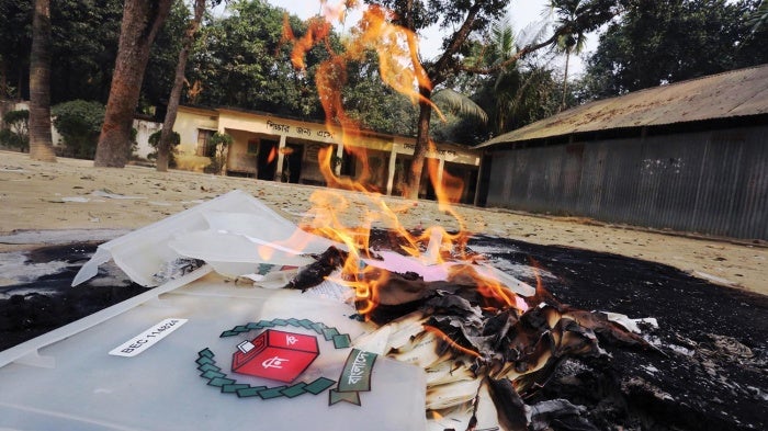 Election materials burn following an attack on a polling station in the northern town of Bogra, Bangladesh, on January 5, 2014. 