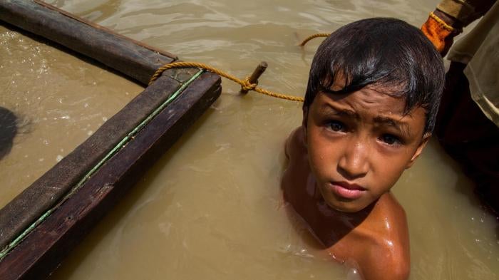 boy works at an underwater mining site
