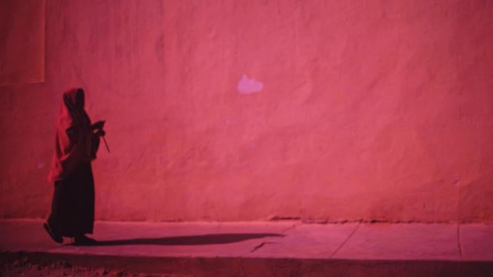 A Somali woman walks alone in central Mogadishu.