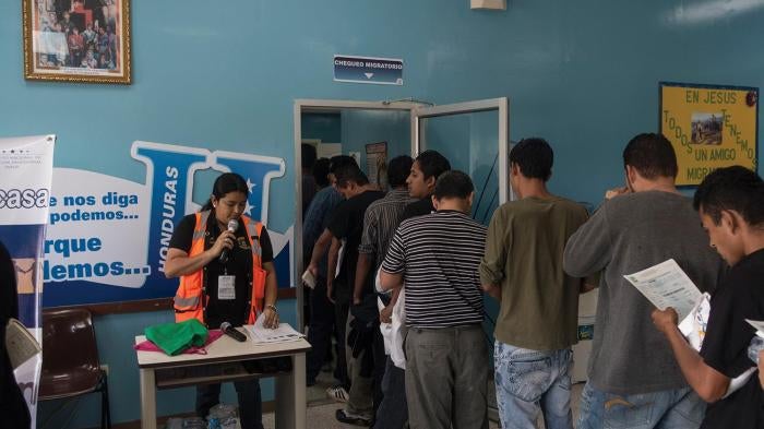 Returned migrants at the Attention Center for the Returned Migrant, San Pedro Sula airport, Honduras.