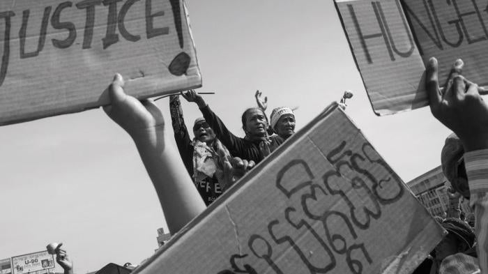 Members of the Boeung Kak Lake community in Cambodia demonstrate at a police blockade in December 2012.