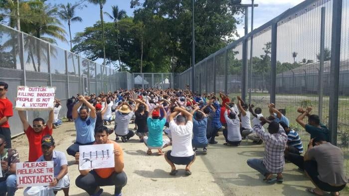 Refugees and asylum seekers protest against Australia’s offshore processing policy at a detention center on Manus Island, Papua New Guinea.