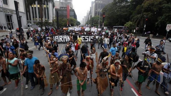 Indigenous Indians from various parts of Brazil take part in a demonstration against proposed constitutional amendment PEC 215, which amends the rules for demarcation of indigenous lands, in Sao Paulo, October 2, 2013. 
